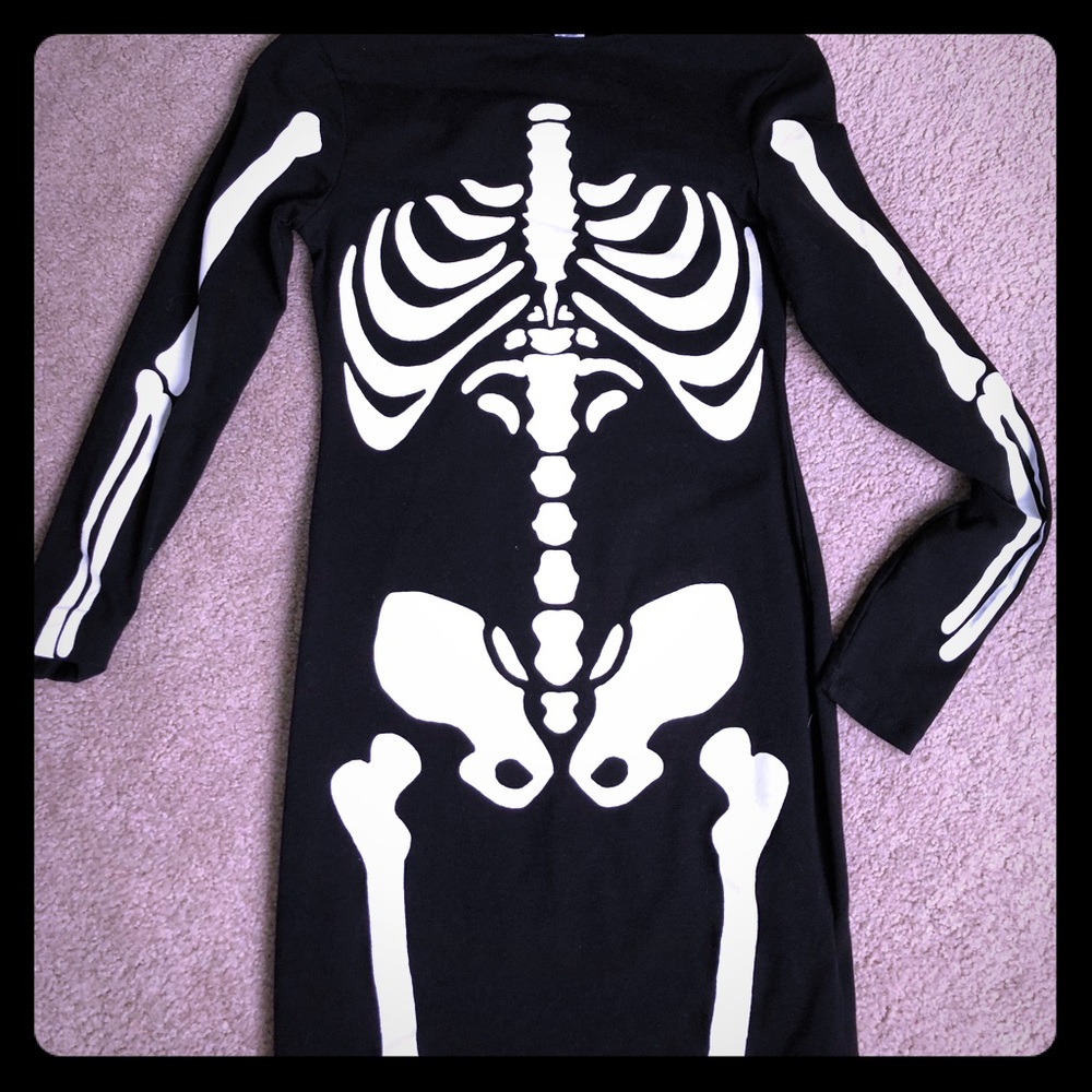 Skeleton body on dress.